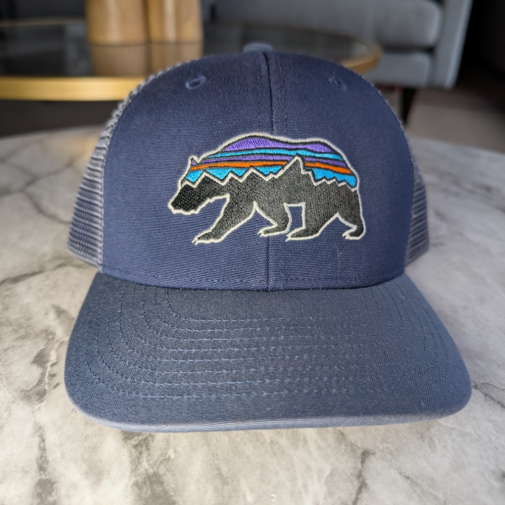 Patagonia Blue Trucker Hat with Bear Design